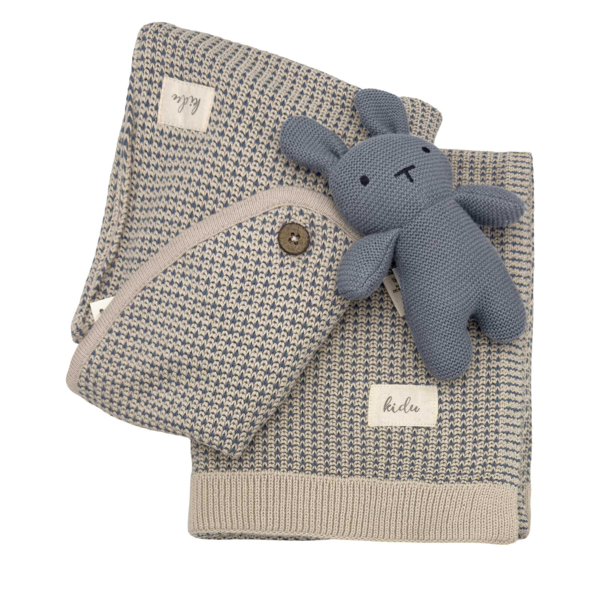 baby Knitted blanket with a blue plush toy on a white background in a matching pouch